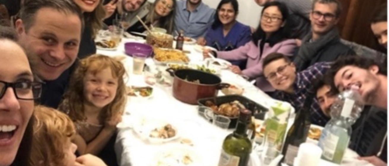 Group of students and families celebrating holiday