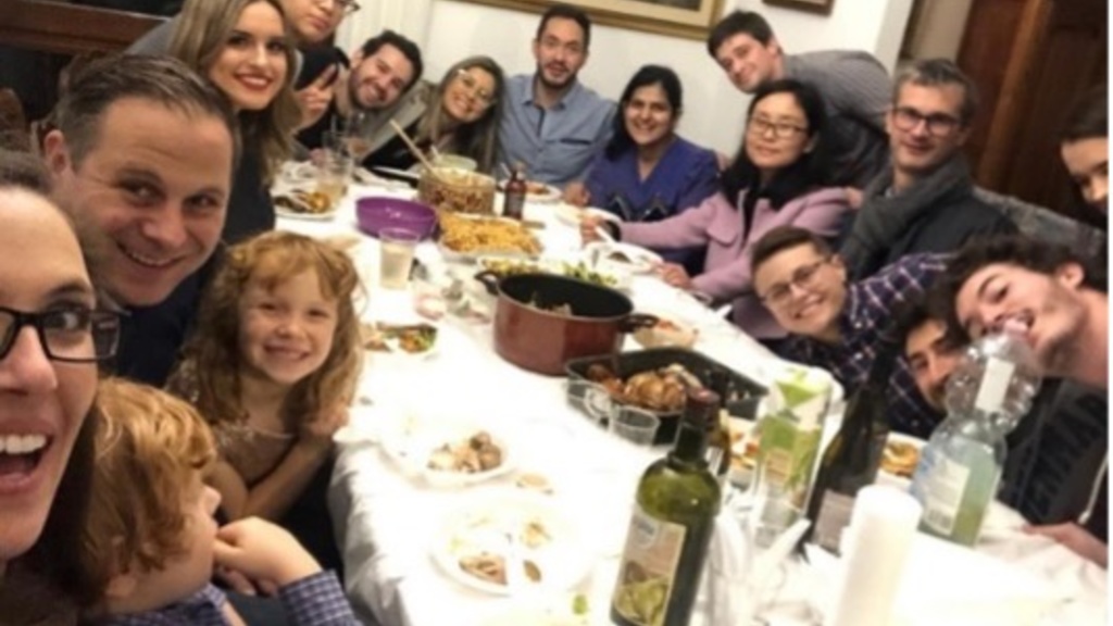 Group of students and families celebrating holiday